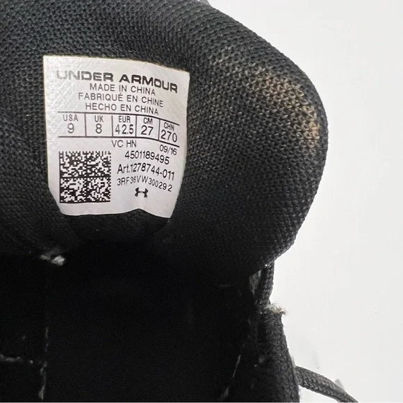 Under armourbaseball tennis shoes black and white size 9 Athletic Shoes